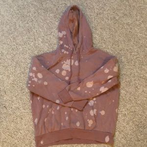 Pink hoodie with fake bleach spot details size small